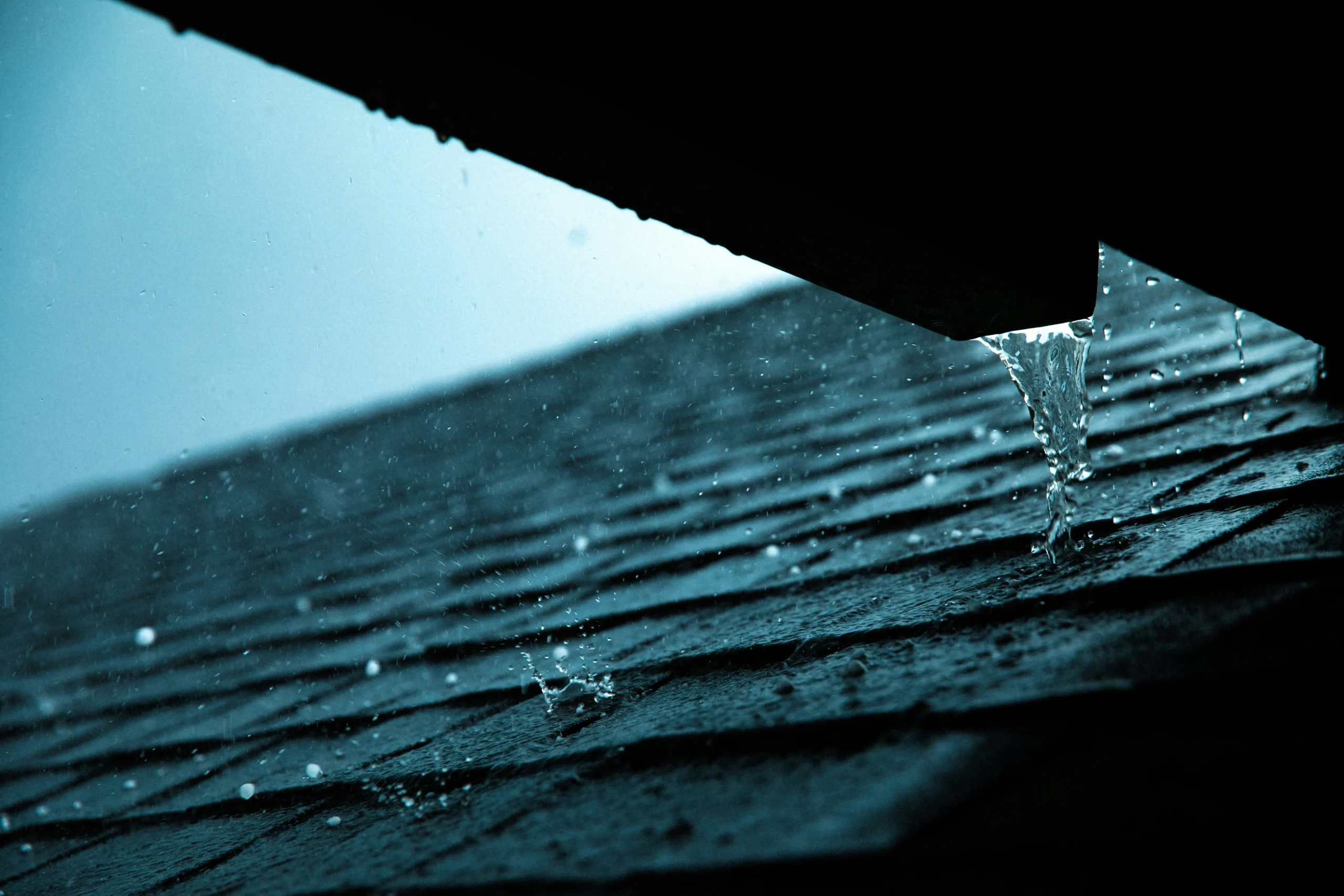 Guttering and roof dripping from the rain